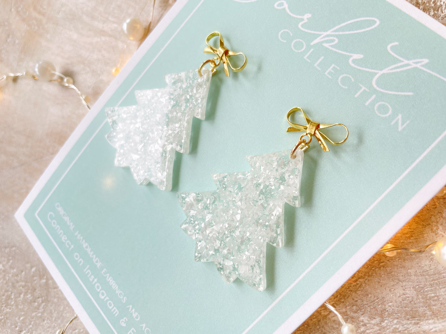 White Shimmer Trees with Gold Bow Earrings